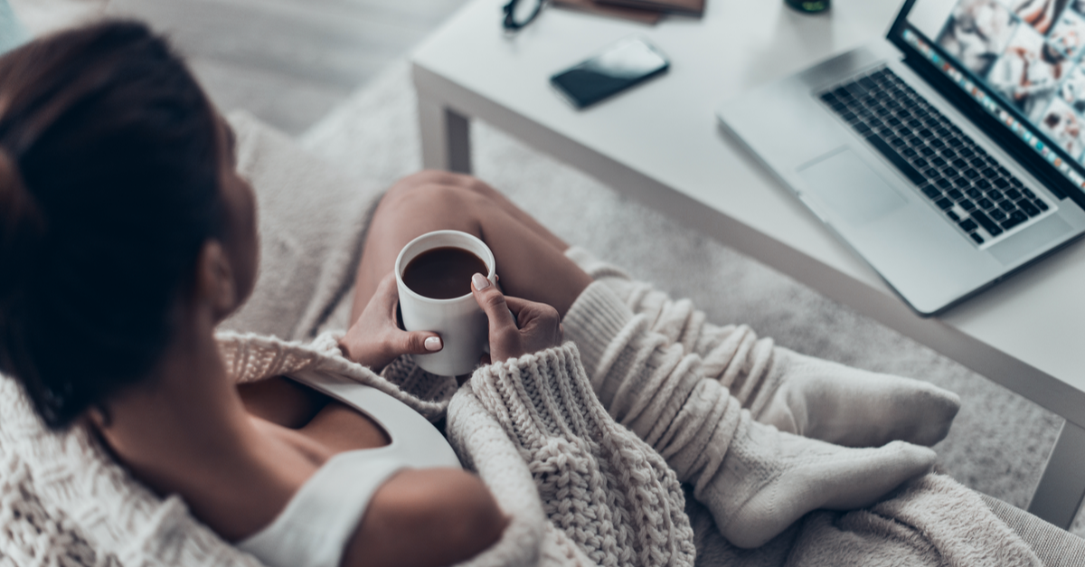 woman working from home with cup of coffee